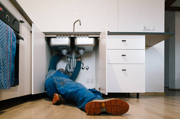 Professional Drain Cleaning technician working in Toledo, OR